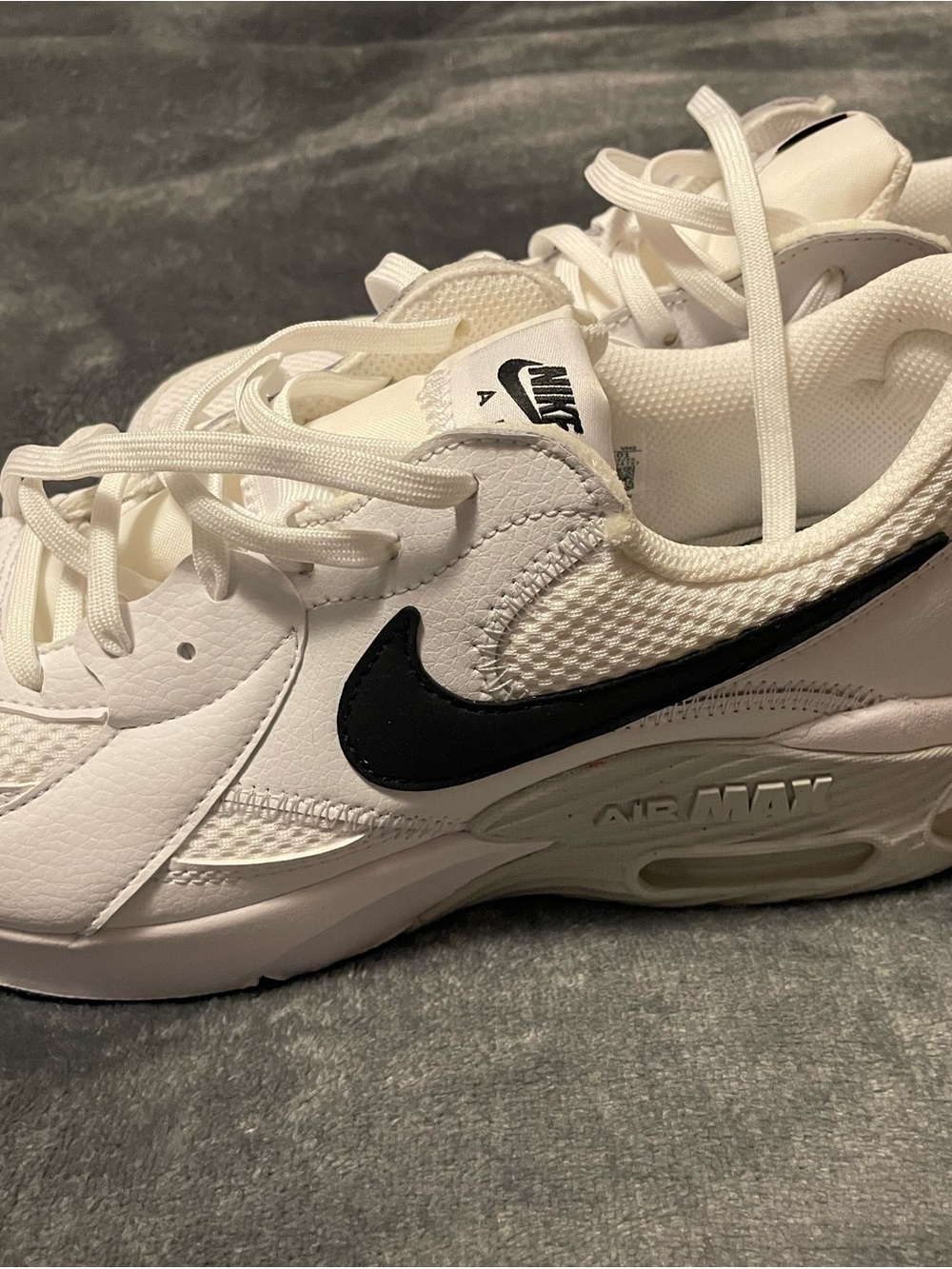 Nike White Sneakers with Black Swoosh